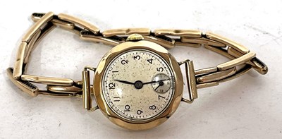 Lot 287 - A ladies 9ct gold cased wrist watch on a 9ct...