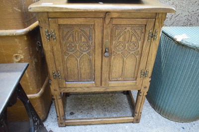 Lot 391 - SMALL OAK TWO-DOOR BEDSIDE CABINET WITH GOTHIC...