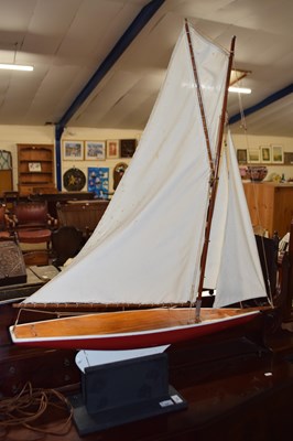 Lot 399 - A large wooden pond yacht with cloth sales and...