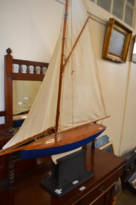 Lot 710 - A large wooden pond yacht with cloth sales and...