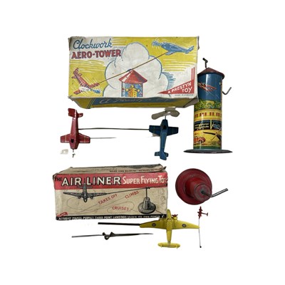 Lot 172 - A pair of vintage tin-plate aeroplane toys...