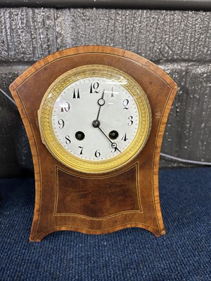 Lot 407 - An Edwardian mantel clock of Waisted form,...