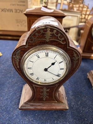 Lot 433 - A Art Nouveau style mantel clock with brass inlay