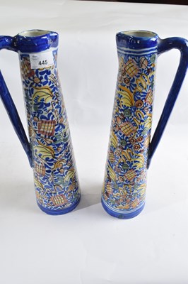 Lot 445 - Two large delft style ewers with polychrome...