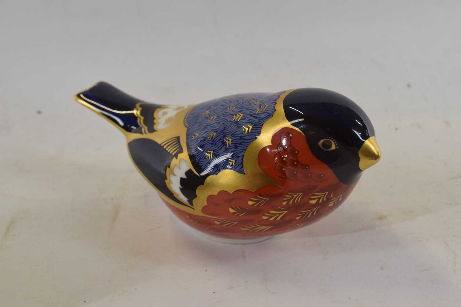 Lot 468 - A Royal Crown Derby gold stopper paperweight...