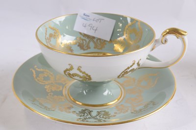 Lot 494 - An Aynsley cup and saucer with a gilt design...
