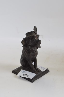 Lot 504 - A cast metal model of Punch's dog with...