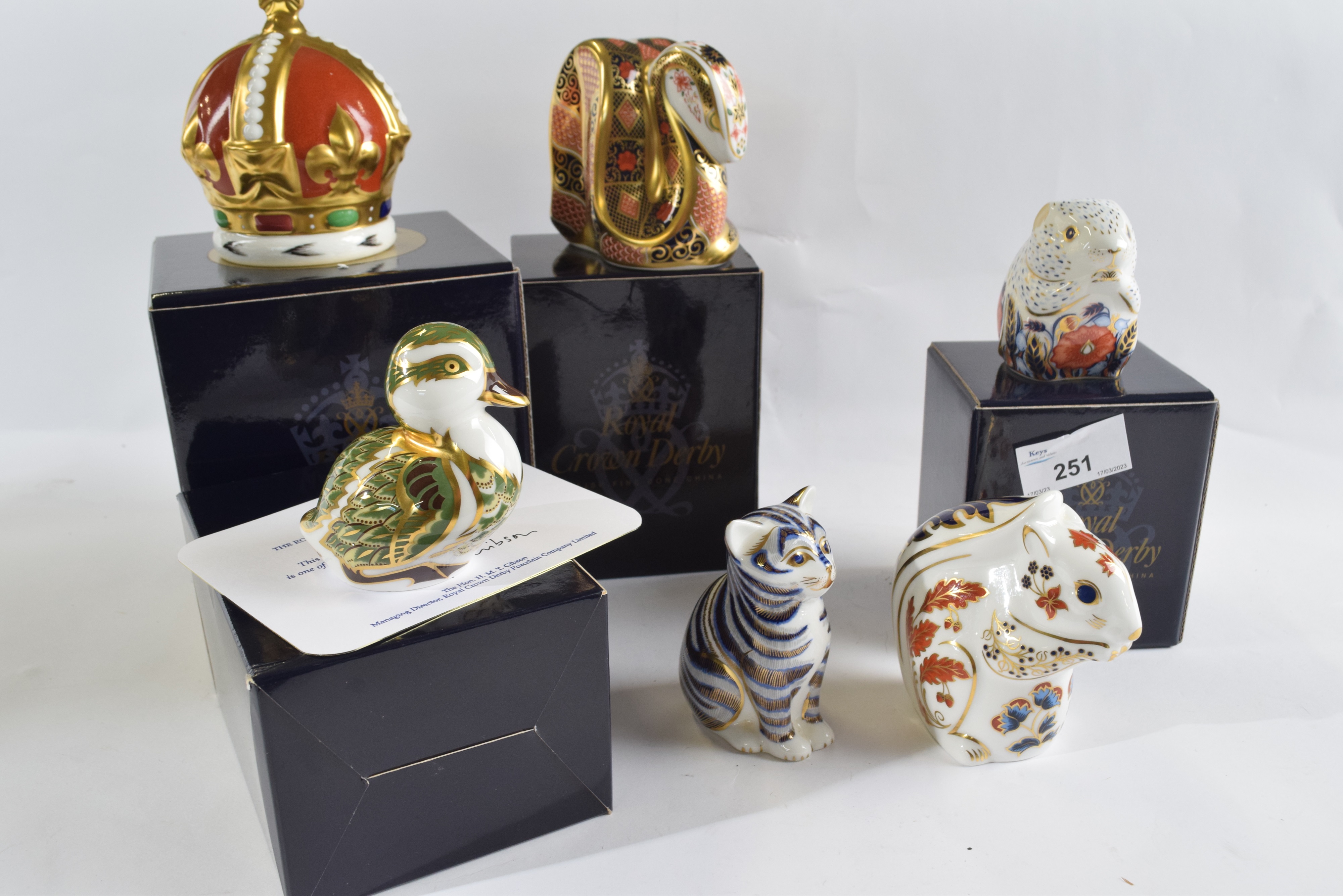 Lot 251 A group of six Crown Derby paperweights
