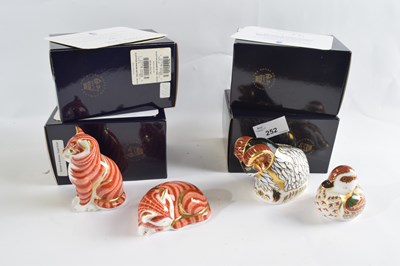 Lot 252 - A group of four Royal Crown Derby paperweights...