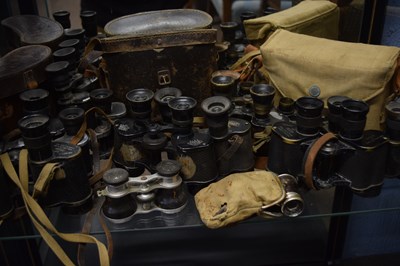 Lot 282 - A large quantity mainly WWII binoculars,...