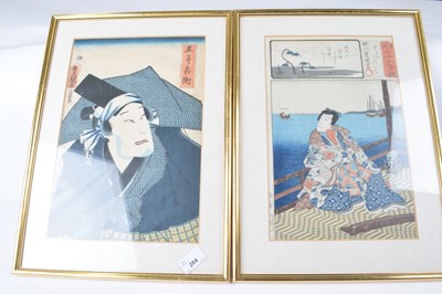 Lot 284 - A pair of Japanese wood block prints in gilt...