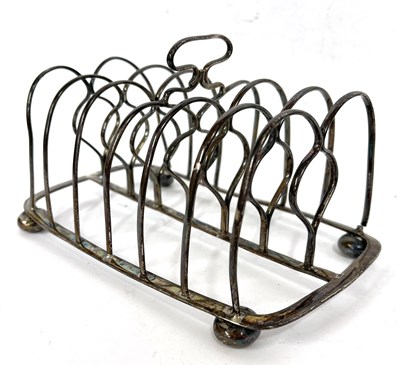 Lot 20 - A George IV silver toast rack of oblong form...