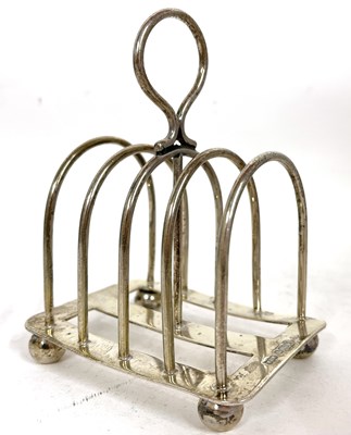 Lot 150 - An Edwardian silver toast rack having four...