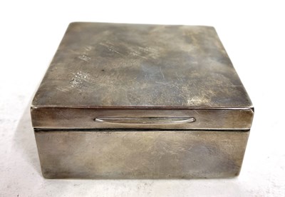 Lot 155 - A hallmarked silver cigarette box of plain...