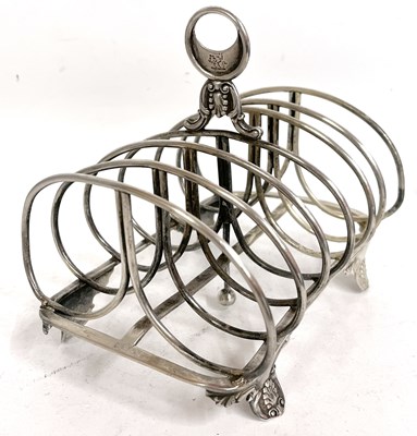 Lot 165 - A large antique silver toast rack of...