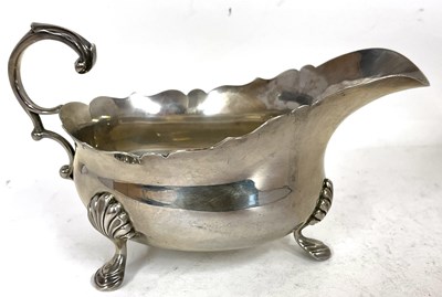 Lot 178 - A George V silver sauce boat of typical form...