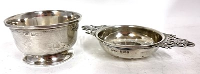 Lot 198 - Hallmarked silver tea strainer and bowl, the...