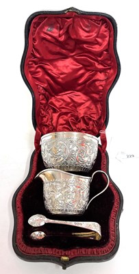 Lot 229 - A Victorian silver cream jug, sugar bowl and...