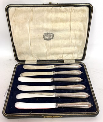 Lot 232A - A cased set of six silver handled butter...