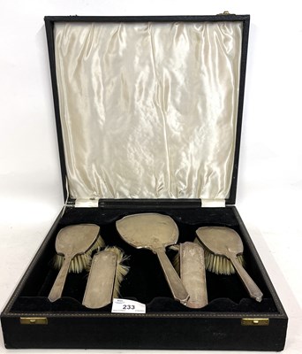 Lot 233 - A cased Edward VII silver backed dressing...