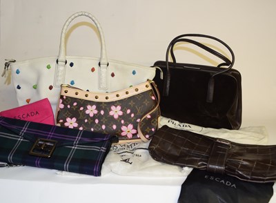 Lot 105 - Five lady's handbags to include a white...