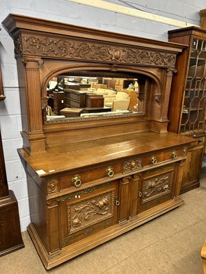 Lot 592 - A large 19th Century oak side cabinet formed...