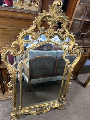 Lot 593 - An 18th Century style gilt wood wall mirror...
