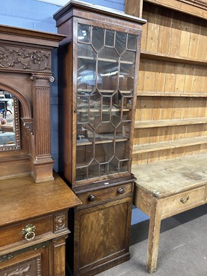 Lot 594 - A 19th Century mahogany two piece bookcase...