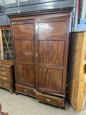 Lot 598 - A 19th Century mahogany wardrobe with moulded...