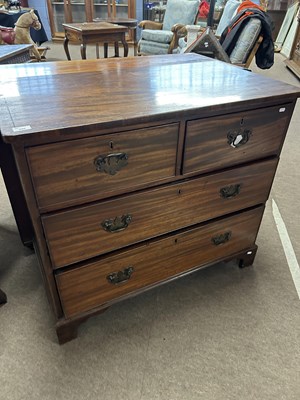 Lot 600 - A 19th Century mahogany chest with two short...