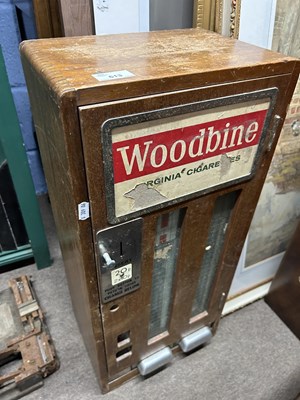 Lot 613 - A vintage Woodbine wall mounted cigarette...