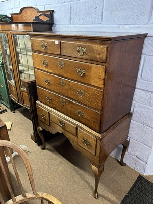 Lot 615 - A George III oak chest on stand, the top...