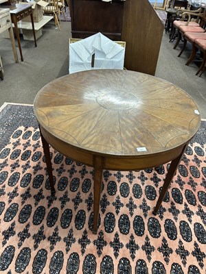 Lot 627 - A Sheraton style circular centre table, the...