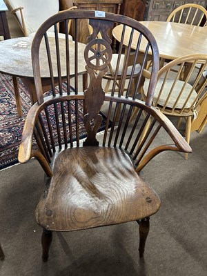 Lot 633 - A 19th Century yew and elm Windsor chair with...