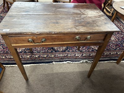 Lot 634 - A Georgian oak single drawer side table fitted...