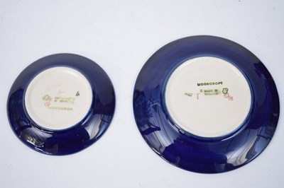 Lot 127 - Two Moorcroft pin dishes with tube lined...