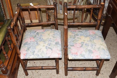 Lot 310 - Pair of bamboo framed corner chairs with...