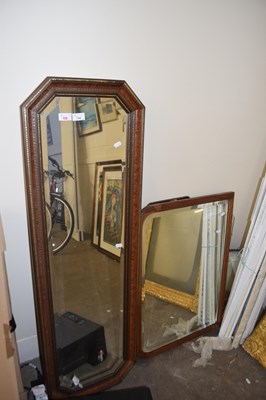 Lot 744 - A rectangular octagonal wall mirror with faux...