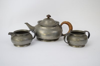 Lot 168 - Pewter Tudric tea pot, milk jug and sugar bowl...