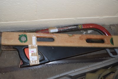 Lot 881 - Quantity of hand saws and a wooden spirit level