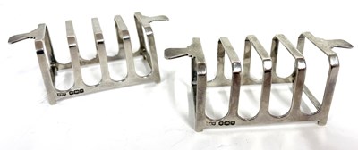 Lot 9 - Pair of George VI silver toast racks of...