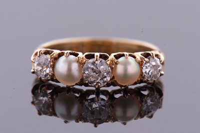 Lot 388 - A five stone diamond and split pearl ring, the...
