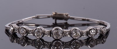 Lot 396 - An early 20th century diamond bracelet, the...