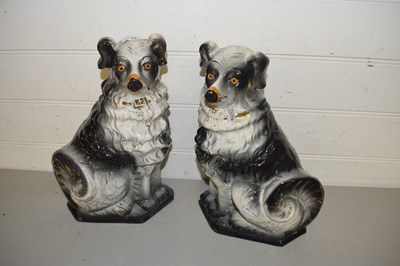 Lot 15 - Pair of pottery dogs