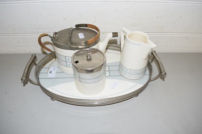 Lot 16 - Porcelain and metal mounted tea set with tray