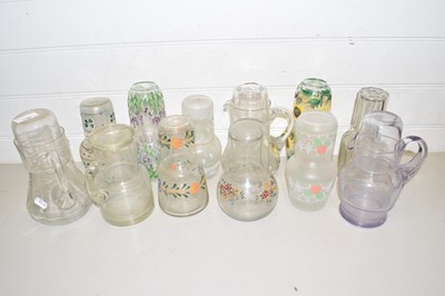 Lot 140 - Collection of various floral decorated carafes...