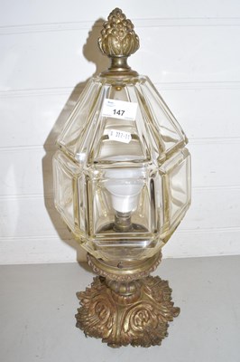 Lot 147 - A brass ceiling light fitting with faceted...