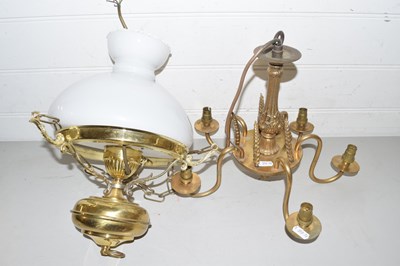 Lot 193 - Hanging brass oil lamp style light fitting...