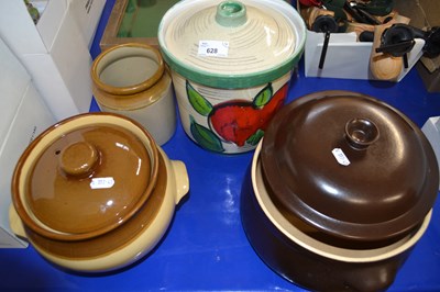 Lot 628 - Two pottery dishes and covers, a biscuit...