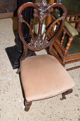 Lot 307 - Late 19th Century shield back nursing chair on...